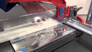 Cutting marble with manual tile cutter [upl. by Yborian810]