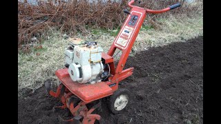 Gilson 5 HP Rototiller Tilling [upl. by Ellerrad]