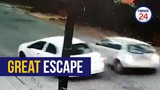 WATCH Motorist escapes hijacking reverses into assailants car [upl. by Htebazle546]