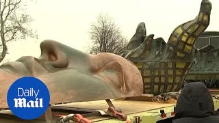 Statue of Libertys original torch moved to new museum home [upl. by Cleo]