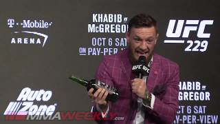 Conor McGregor Sneaks Whiskey Into the Press Conference UFC 229 [upl. by Bourne103]